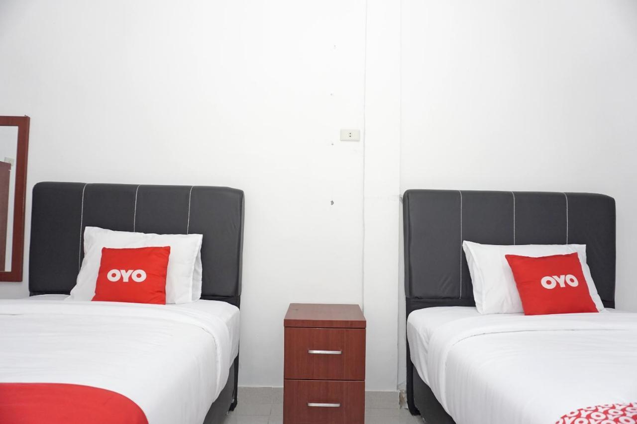Oyo 2635 Ramos Inn Sinapuran Eksteriør billede